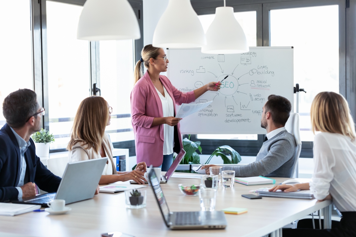 Businesswoman explaining SEO to her team